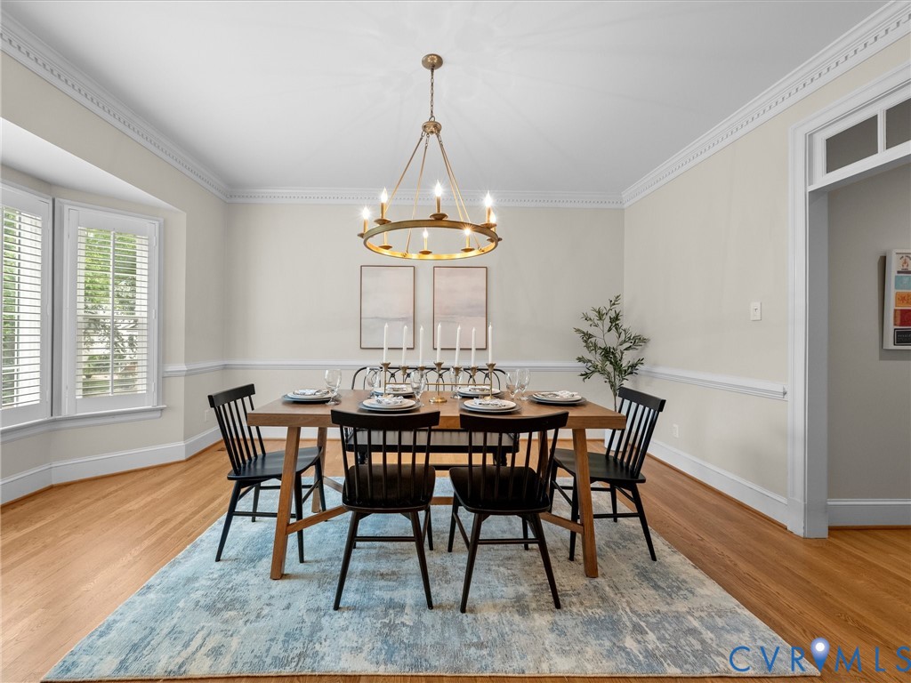 2011 Gamelaw Court Midlothian, VA 23113 - Photo 12 of 77 a view of a dining room with furniture window and wooden floor