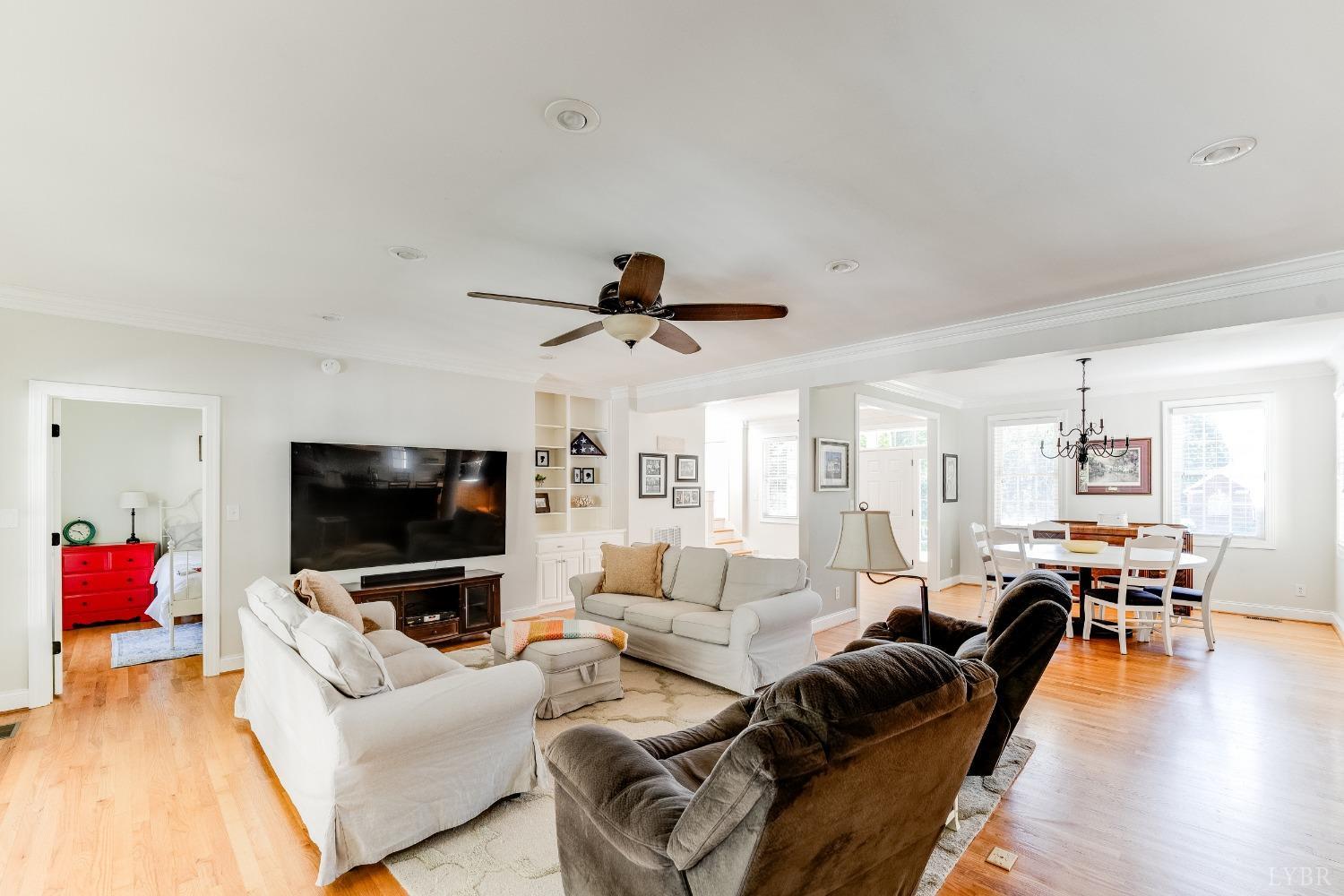 212 Barringer Drive Rustburg, VA 24588 - Photo 18 of 63 a living room with furniture and a flat screen tv