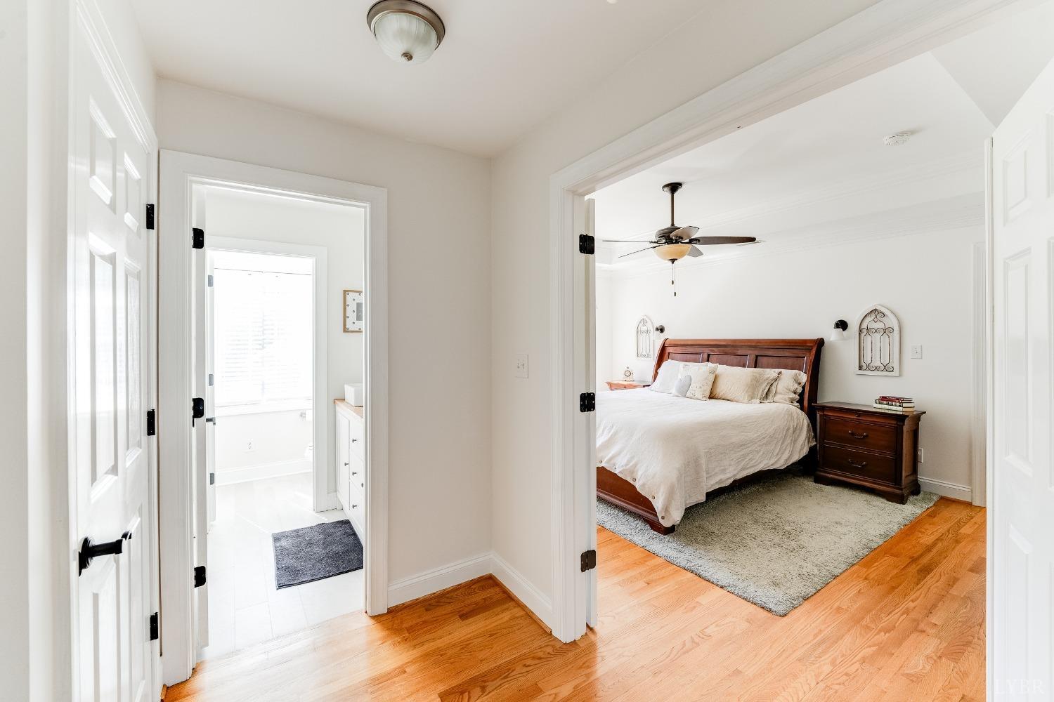 212 Barringer Drive Rustburg, VA 24588 - Photo 33 of 63 a bedroom with a bed and wooden floor