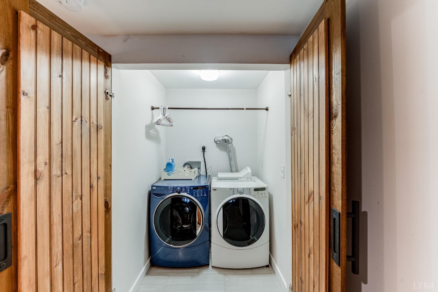 212 Barringer Drive Rustburg, VA 24588 - Photo 41 of 63 a utility room with dryer and washer