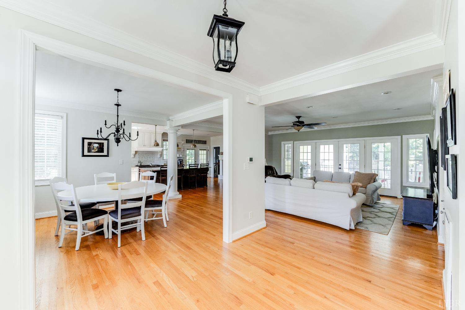 212 Barringer Drive Rustburg, VA 24588 - Photo 5 of 63 a living room with furniture dining table and wooden floor