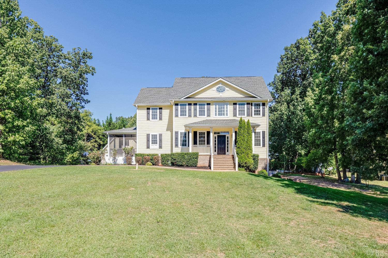 212 Barringer Drive Rustburg, VA 24588 - Photo 56 of 63 a front view of a house with a yard