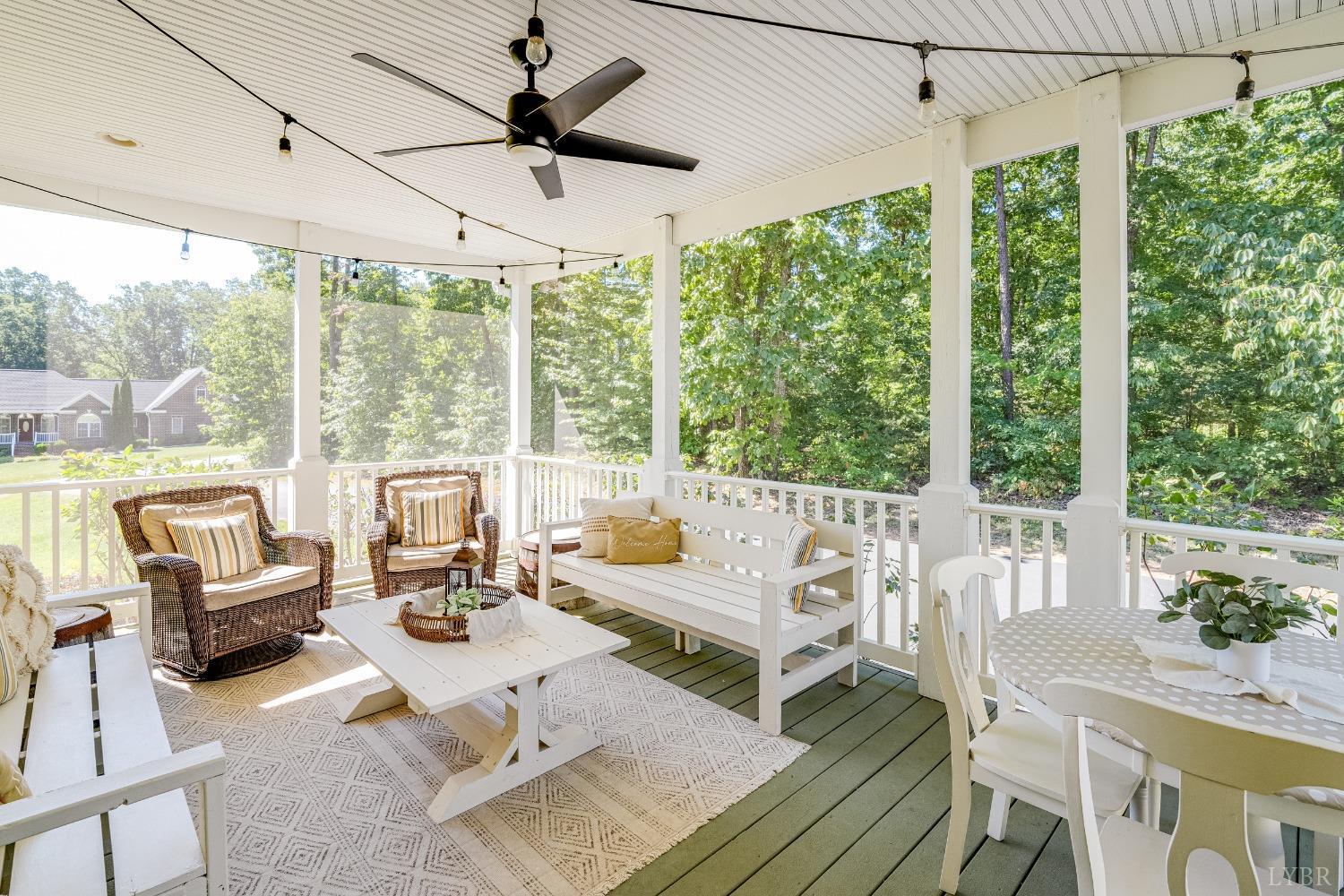 212 Barringer Drive Rustburg, VA 24588 - Photo 57 of 63 a living room with furniture and a large window