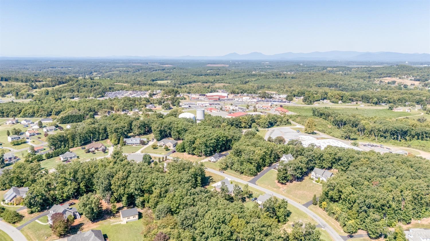 212 Barringer Drive Rustburg, VA 24588 - Photo 61 of 63 an aerial view of residential houses with outdoor space and trees