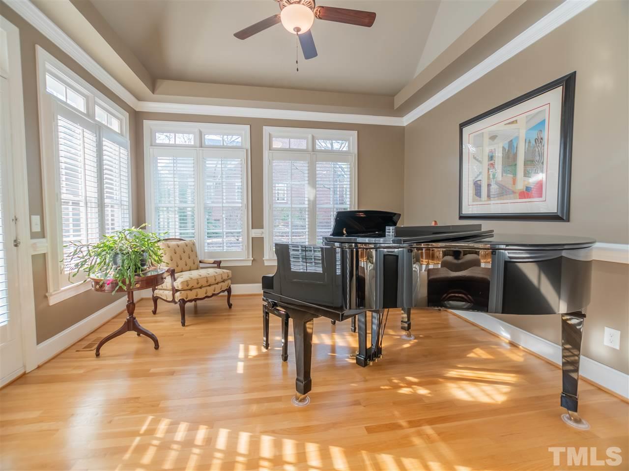 4016 White Chapel Way Raleigh, NC 27615 - Photo 30 of 30 This beautiful space with two walls of windows adds flexibility to the floor plan offering pocket doors for privacy and a french door leading to the rear deck.