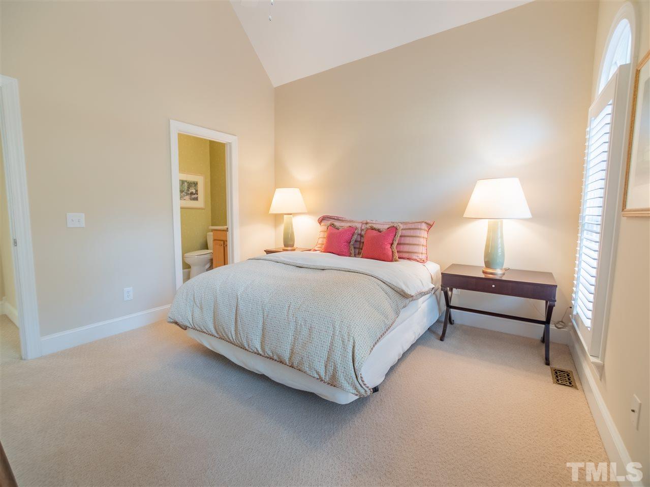 4016 White Chapel Way Raleigh, NC 27615 - Photo 13 of 30 This 1st floor room with en suite bath is currently being used as a guest room but could also double as a home office.