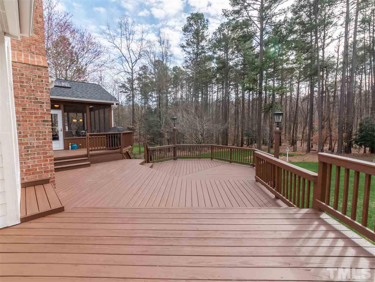 4016 White Chapel Way Raleigh, NC 27615 - Photo 28 of 30 The newly refurbished multi level deck is perfect for entertaining!