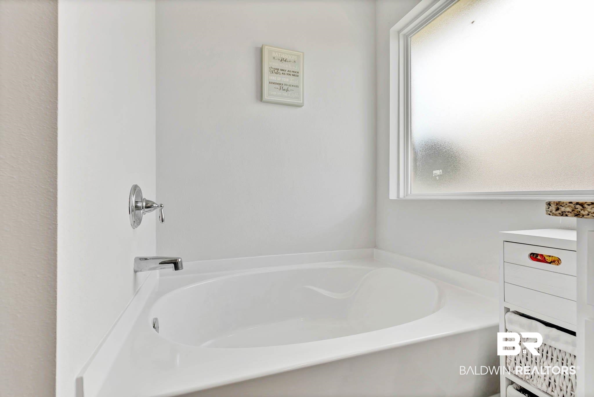 17217 REFLECTION Street Loxley, AL 36551 - Photo 25 of 83 Primary En Suite Bathroom featuring a spacious closet, double vanity, a garden tub, a stall shower, and lvp flooring.