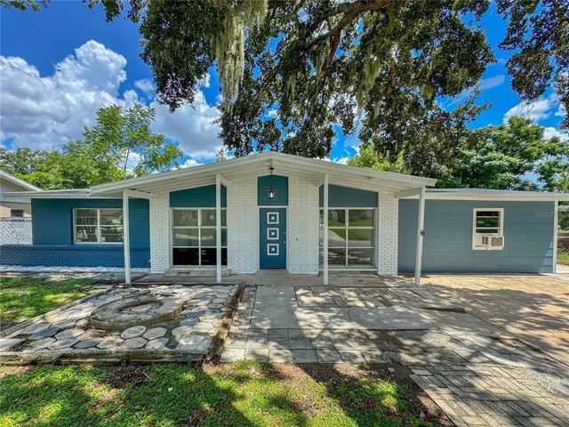 front view of a house with a patio
