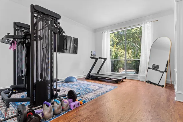 a room with furniture and a flat screen tv