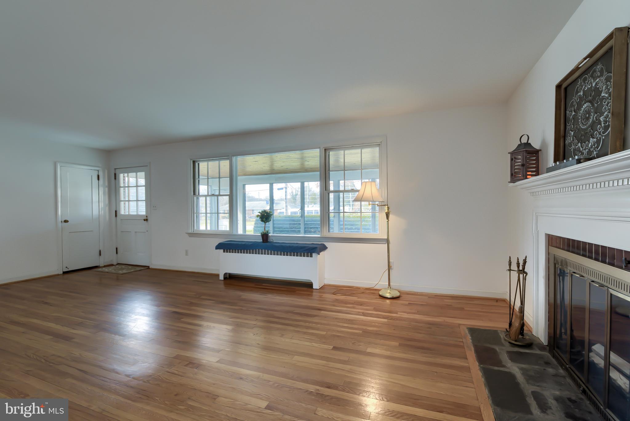 1311 Marsh Road Wilmington, DE 19803 - Photo 9 of 29 Livingroom opens to enclosed front porch