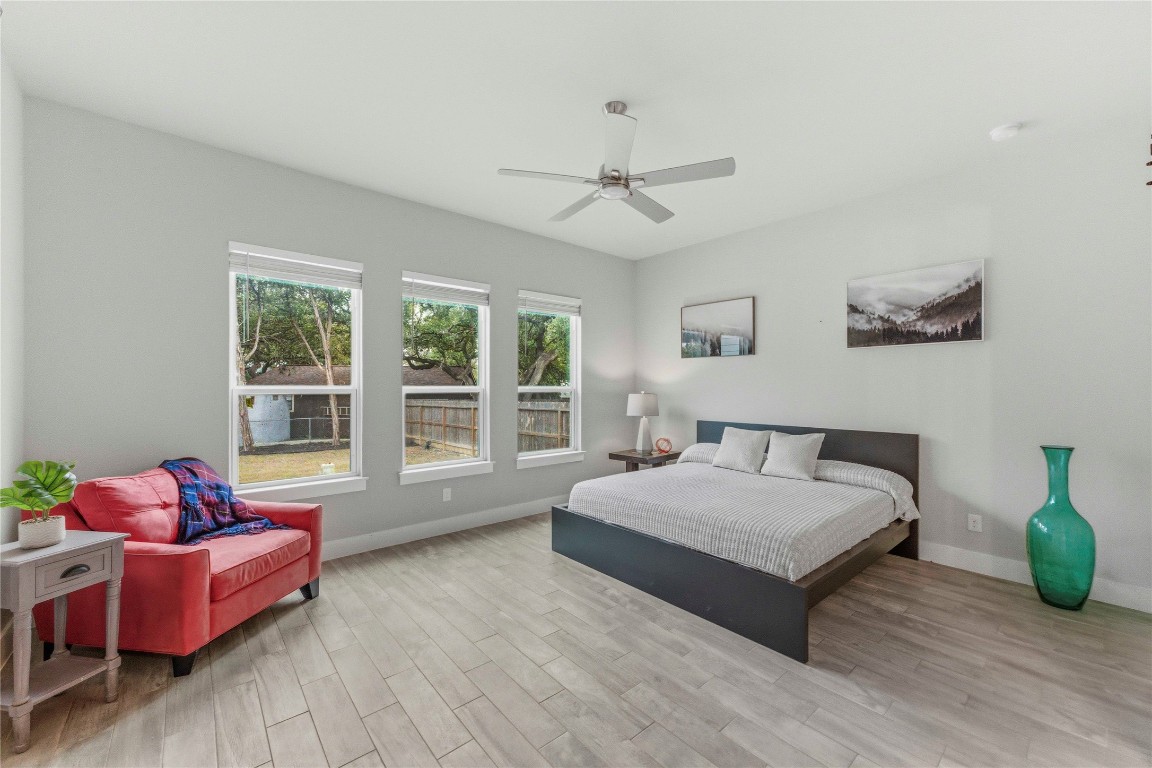 184 Granite Road Spring Branch, TX 78070 - Photo 11 of 27 Bedroom with wood tiled floors and a ceiling fan