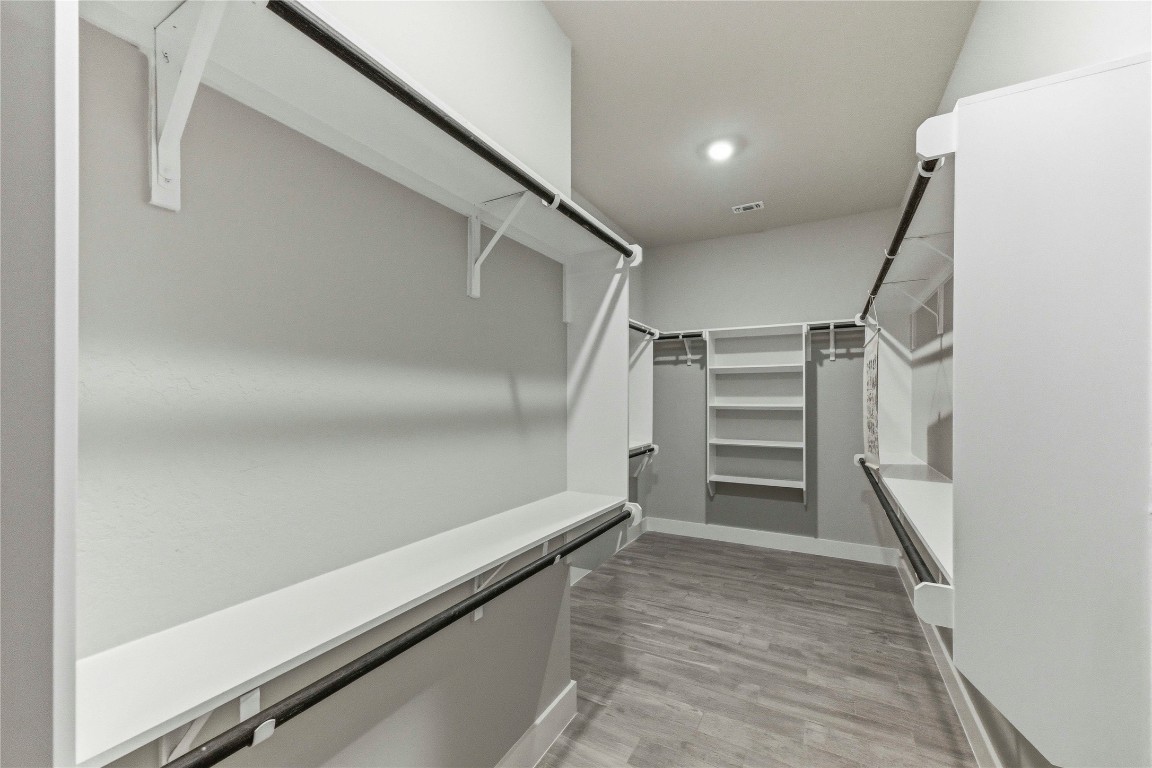 184 Granite Road Spring Branch, TX 78070 - Photo 15 of 27 Spacious closet with light wood-style floors