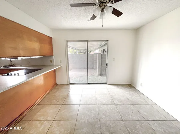 a kitchen with stainless steel appliances a sink and a refrigerator