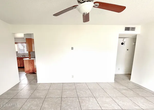 a view of a kitchen with a sink