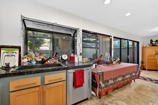 a bed room with two beds and a large window