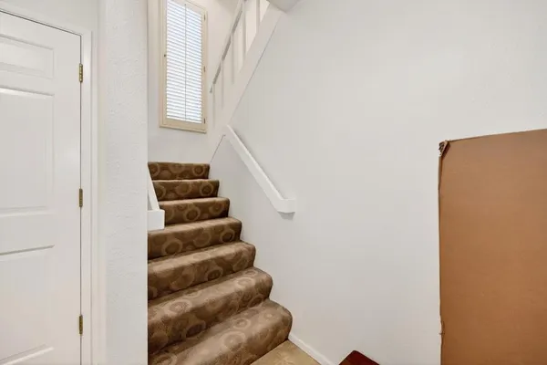 a view of entryway with stairs