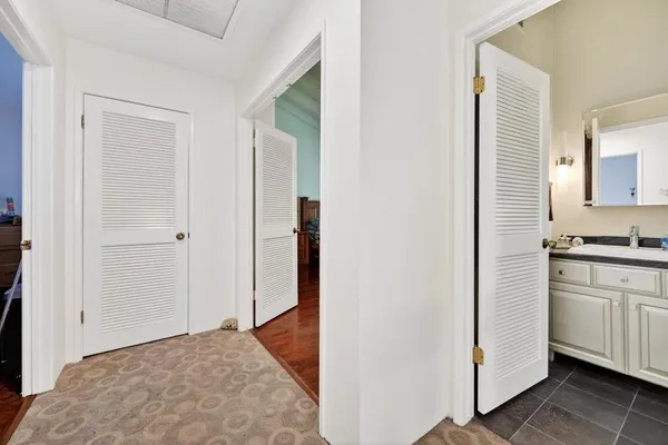 a view of a kitchen from the hallway