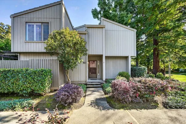 a front view of a house having yard