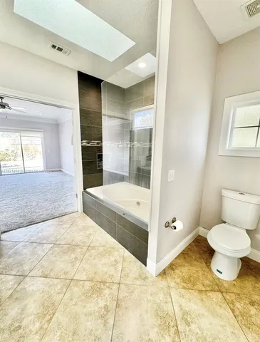 a bathroom with a sink double vanity and a mirror