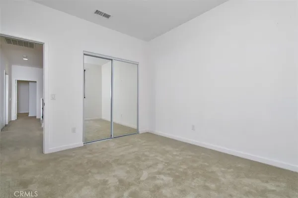 a bathroom with a granite countertop sink