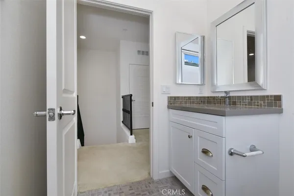 a bathroom with a sink a toilet and a bathtub