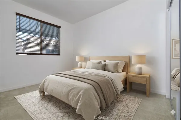 an empty room with closet area