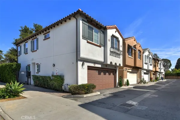 a front view of a house with garage