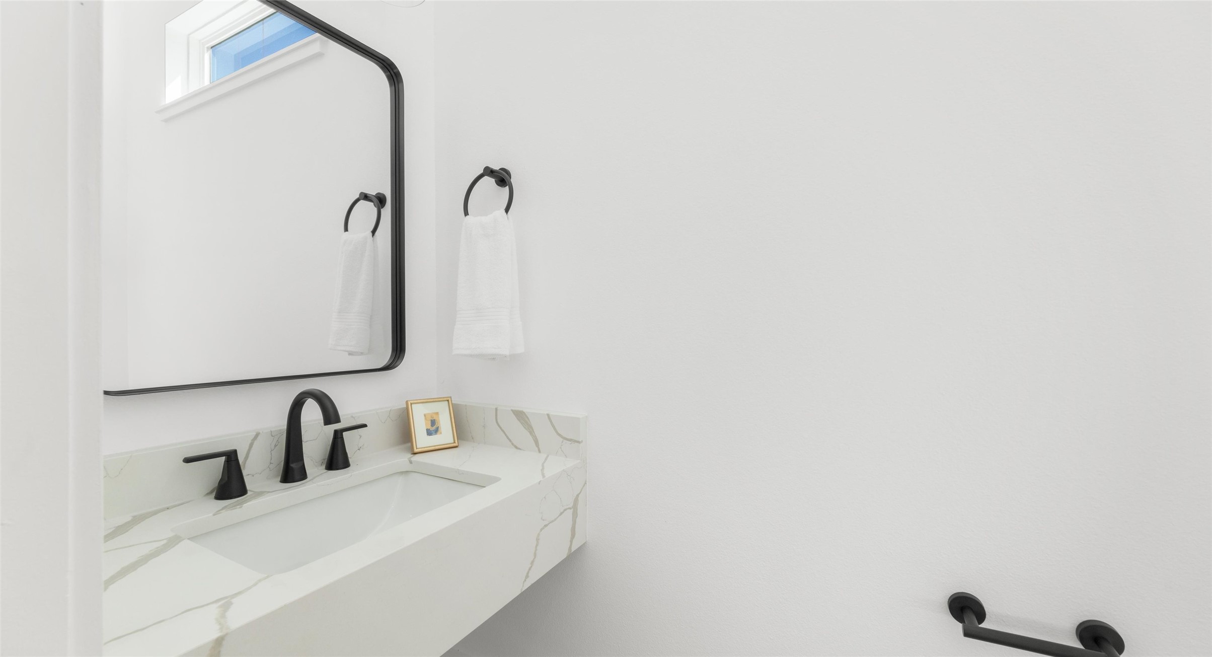 5912 Harold Court, Unit 107 Austin, TX 78721 - Photo 8 of 35 A double-vanity bath in a clean, contemporary palette that makes everyday routines feel a little more luxurious. Model No. 105 Shown.