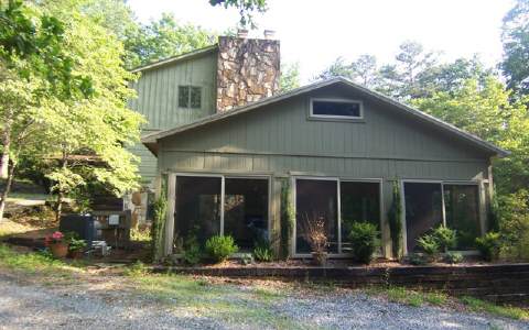 544 River Ridge Blue Ridge, GA 30513 - Photo 1 of 1 a front view of a house with garden