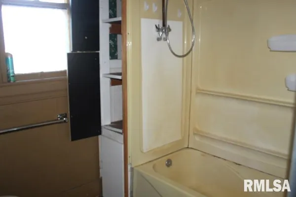 a bathroom with a toilet and a sink