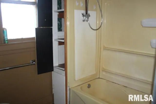 a bathroom with a toilet and a sink