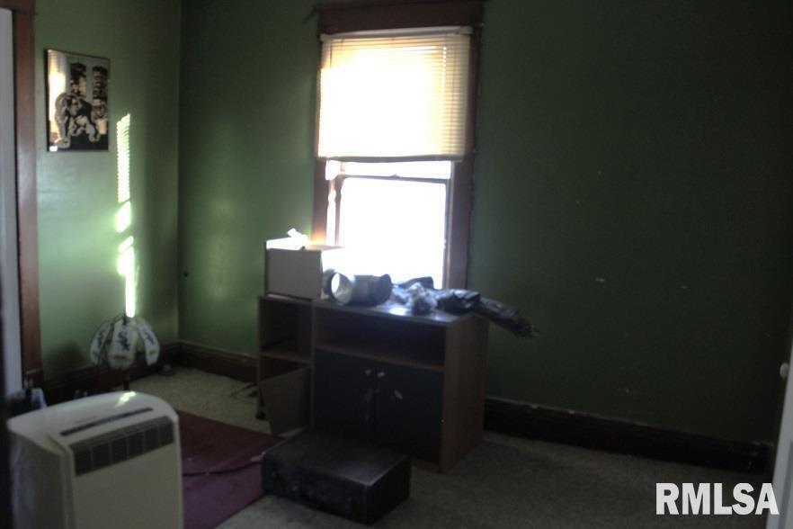 714 South Main Street Kewanee, IL 61443 - Photo 29 of 31 a room with furniture and a window