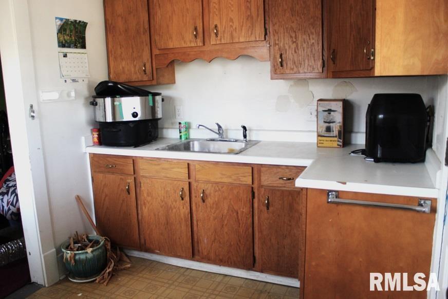 714 South Main Street Kewanee, IL 61443 - Photo 30 of 31 a kitchen with a sink and cabinets