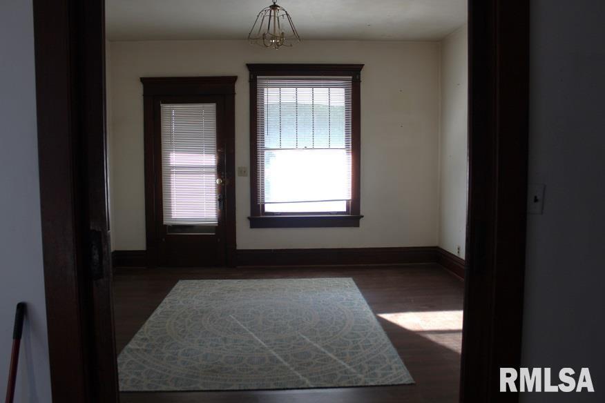 714 South Main Street Kewanee, IL 61443 - Photo 7 of 31 a view of empty room with windows
