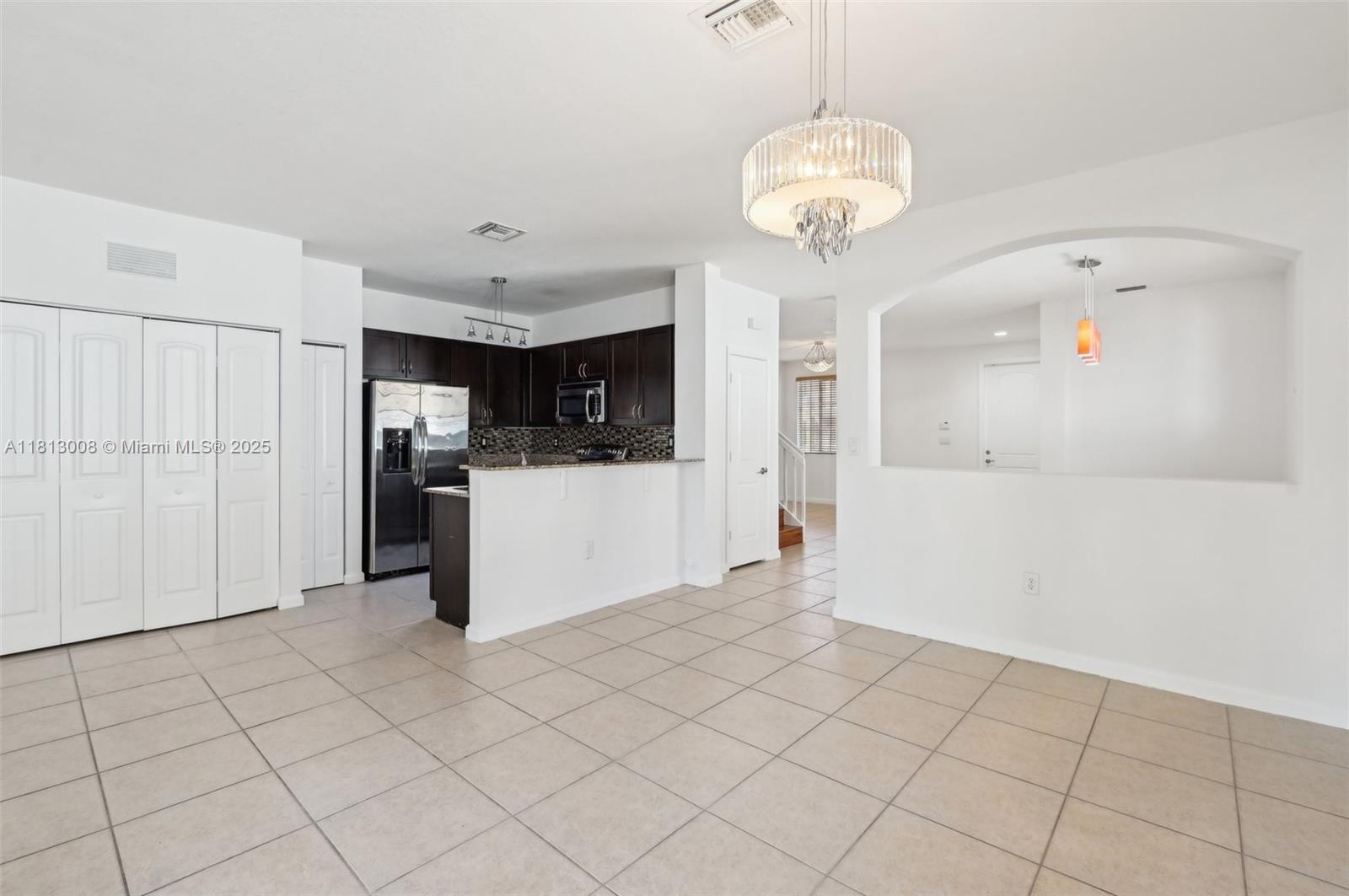 14110 Southwest 275th Street, Unit 14110 Homestead, FL 33032 - Photo 13 of 51 Family Room/Kitchen
