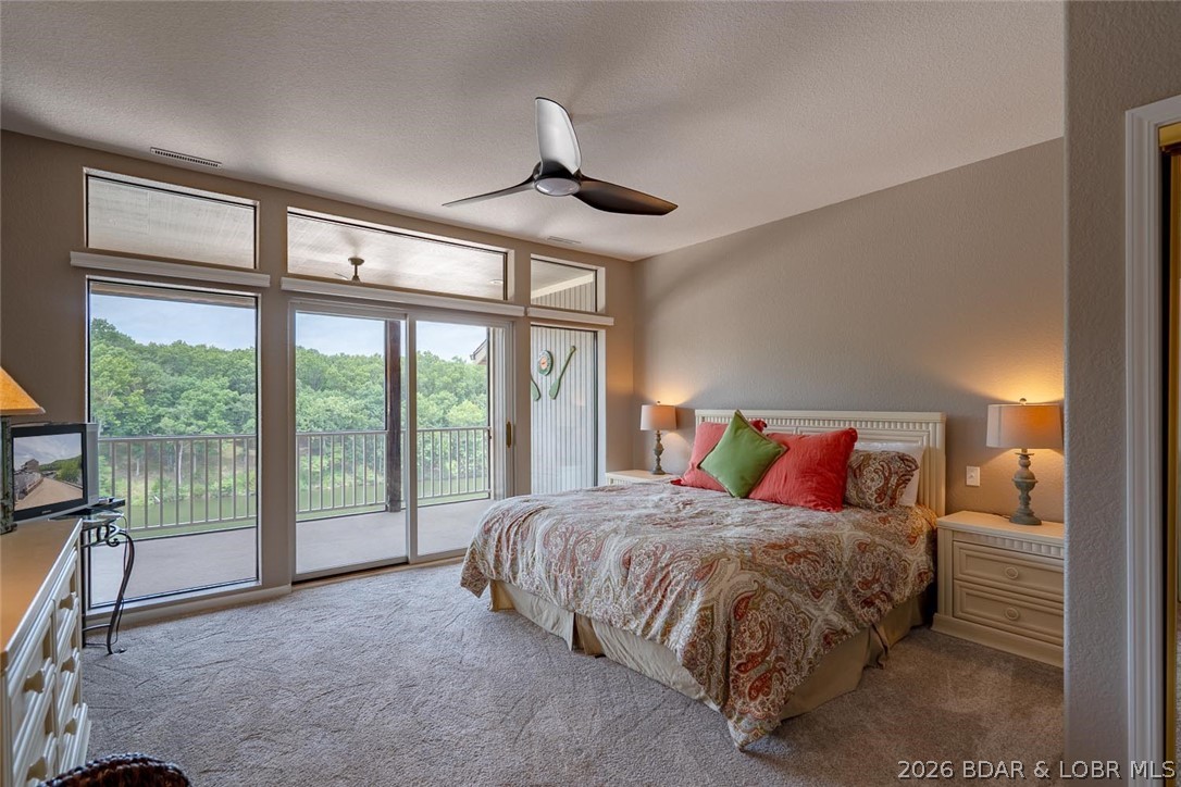 611 Lays Days Road, Unit R8 Osage Beach, MO 65065 - Photo 20 of 35 Primary Suite