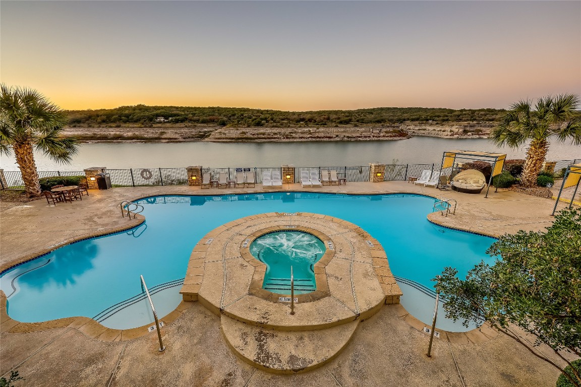 3404 American Drive, Unit 3300 Lago Vista, TX 78645 - Photo 19 of 39 a view of a lake with a mountain view