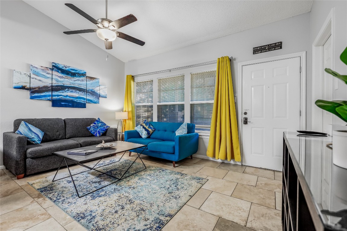 3404 American Drive, Unit 3300 Lago Vista, TX 78645 - Photo 23 of 39 a living room with furniture and a window