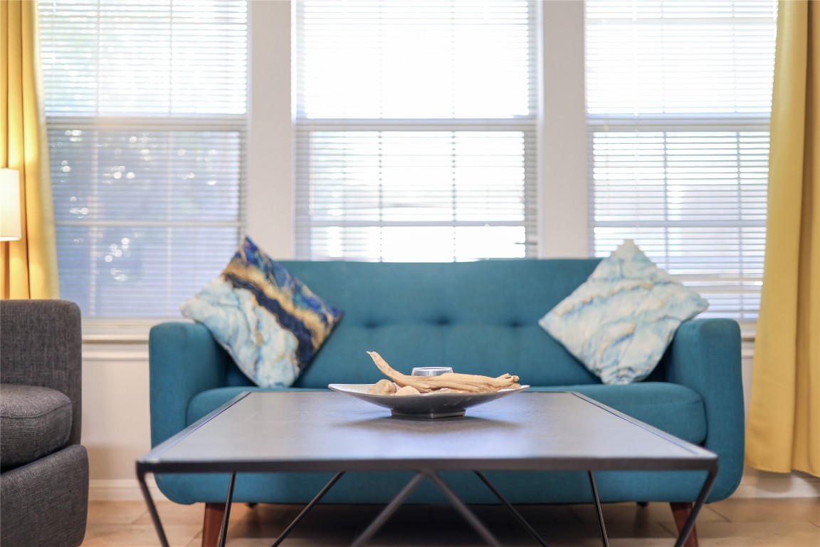 3404 American Drive, Unit 3300 Lago Vista, TX 78645 - Photo 34 of 39 a living room with furniture and a window