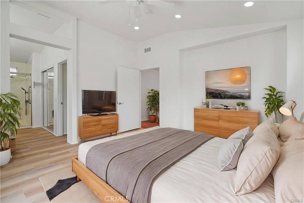 701 Caliente Way Oxnard, CA 93036 - Photo 6 of 7 a bedroom with a bed and a flat screen tv