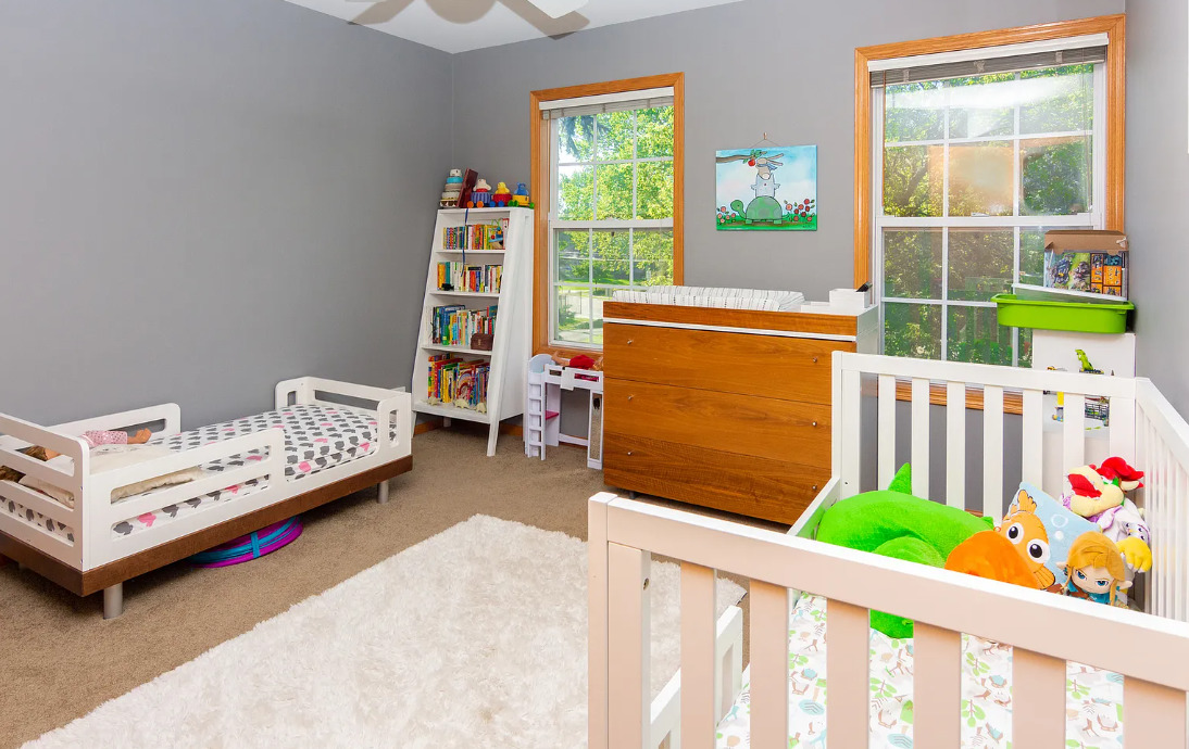 1934 Manning Road Darien, IL 60561 - Photo 14 of 18 a bedroom with furniture and a window