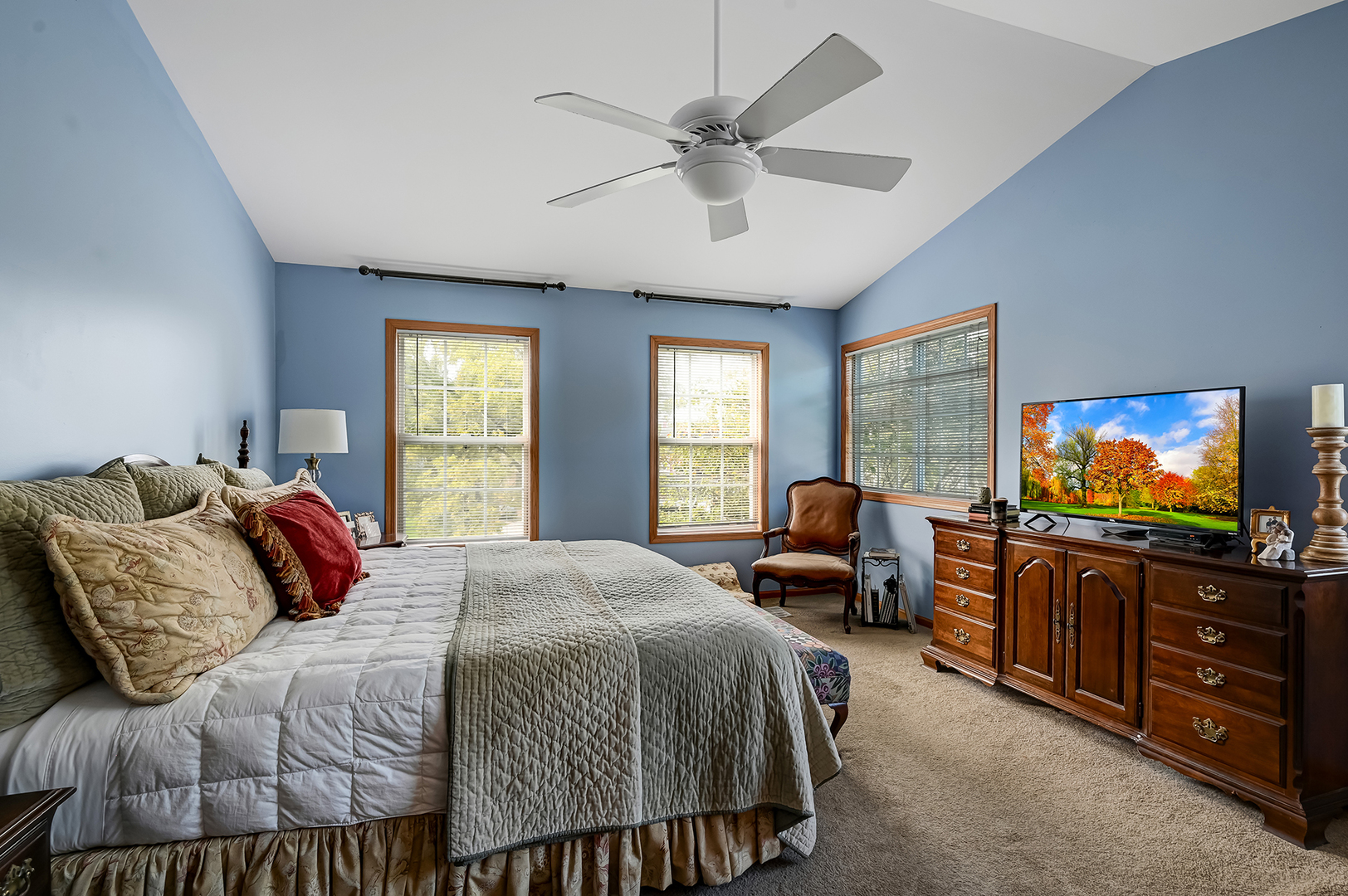 1934 Manning Road Darien, IL 60561 - Photo 10 of 18 a bedroom with a bed and a flat screen tv