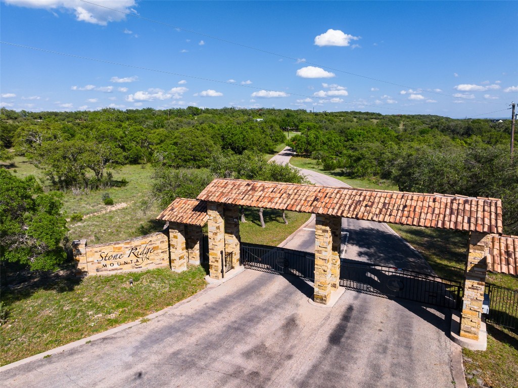 1440 Stone Ridge Mountain Drive Round Mountain, TX 78663 - Photo 23 of 23 a view of a terrace with a garden