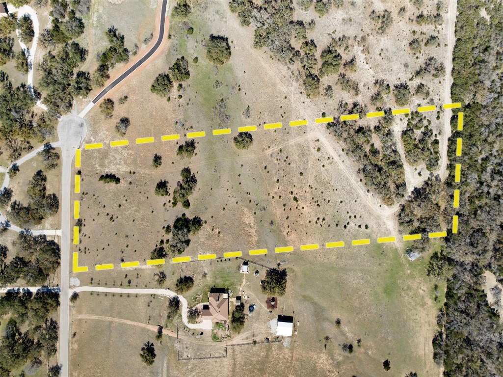 1440 Stone Ridge Mountain Drive Round Mountain, TX 78663 - Photo 6 of 23 a bathroom with a bathtub and a shower
