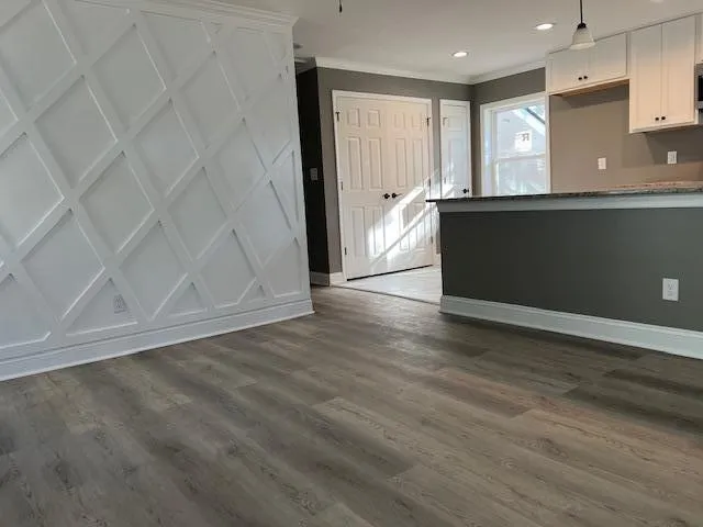 a view of kitchen with wooden floor