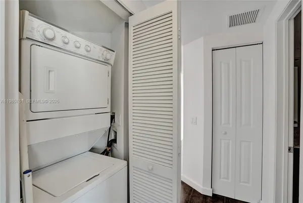 a terrace of a house with outdoor seating