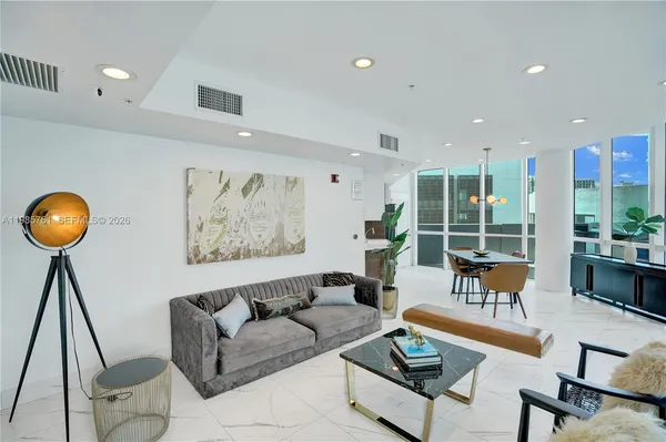 a view of a city with tall buildings