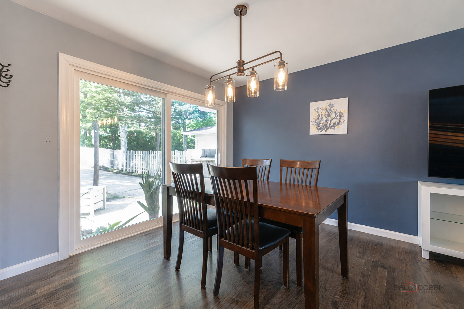 489 1st Street Antioch, IL 60002 - Photo 7 of 33 a view of a dining room with furniture window and wooden floor