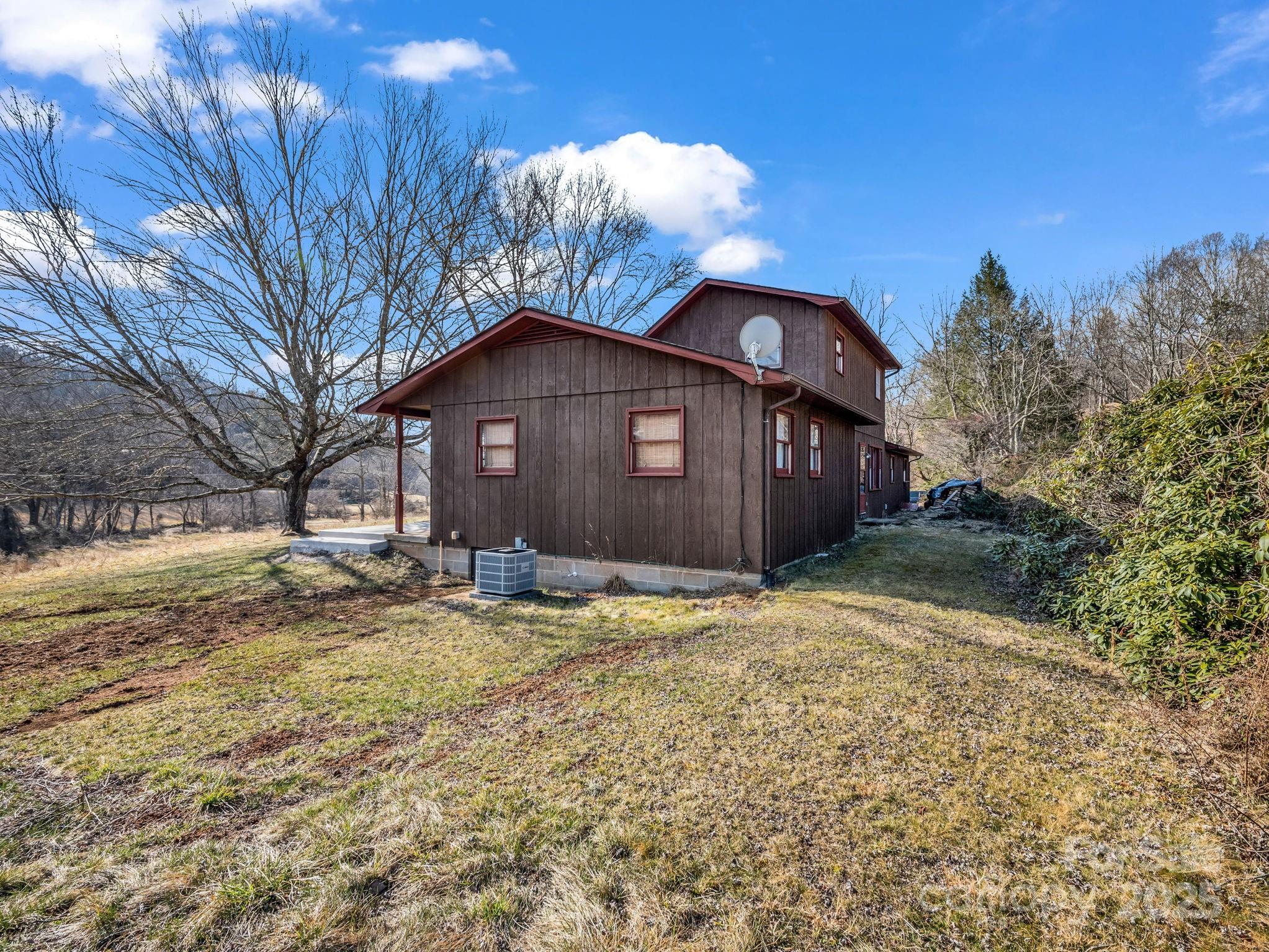 132 Hurd Road Canton, NC 28716 - Photo 14 of 46 a view of a house with a yard
